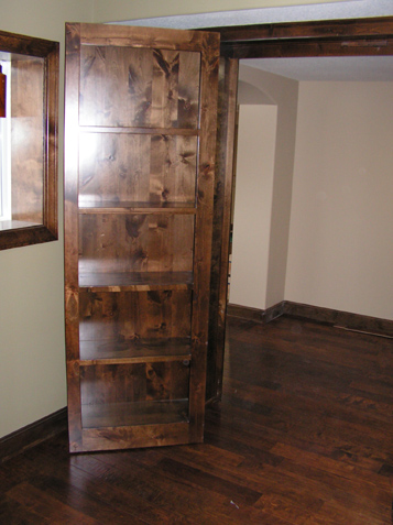 Hinged bookcases as seen from inside the secret room